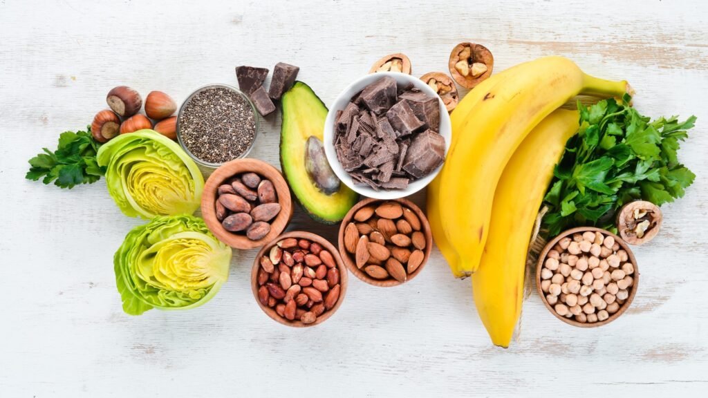 a colorful assortment of foods high in magnesium on a kitchen table